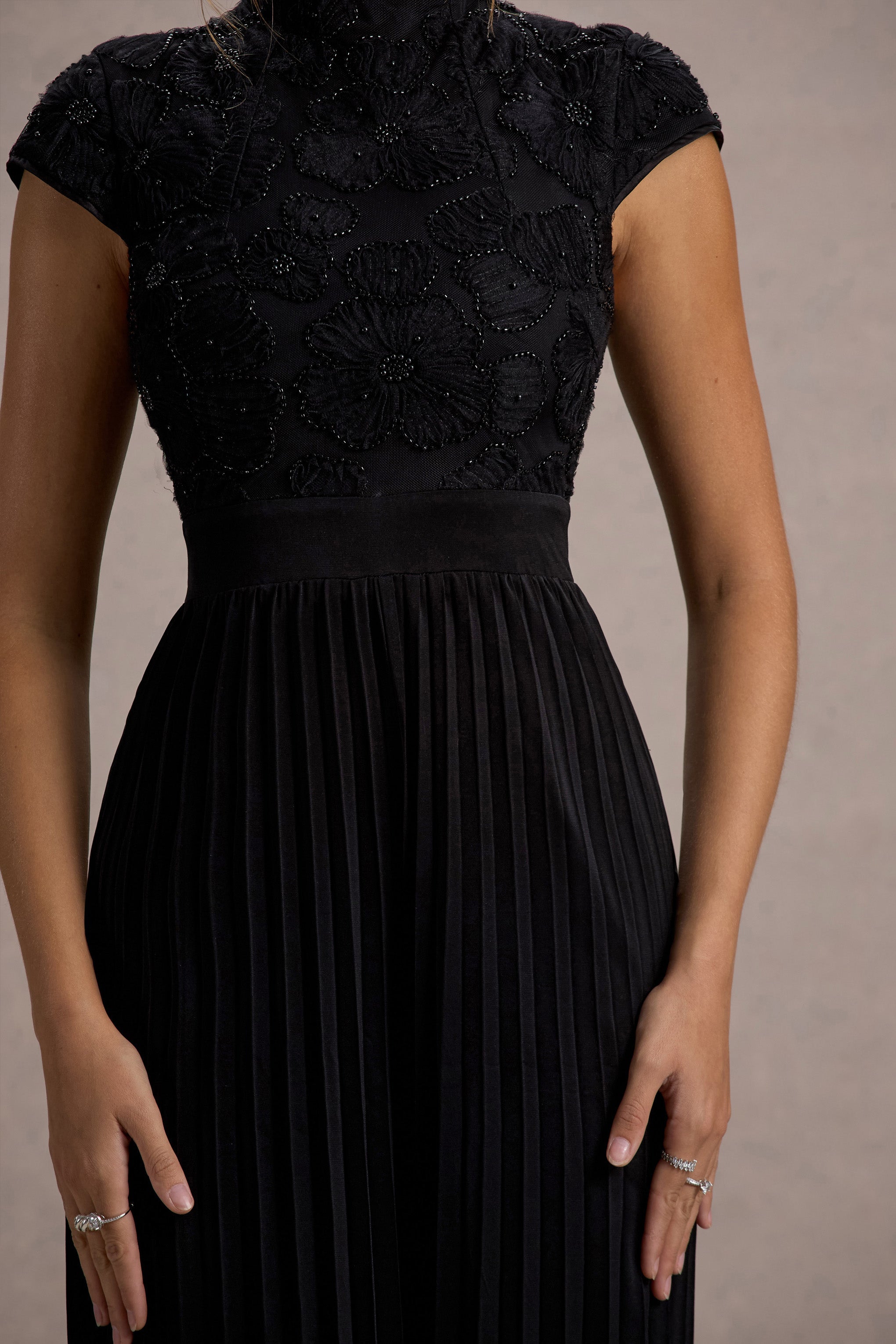 Tanner | Black Cap-Sleeve Plisse Wide-Leg Jumpsuit